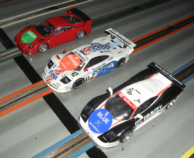 The 1/32 Modern GT cars ready for the start.;<br />Stoo, Jake and Troy.