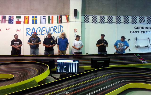 The Drivers ready for the start of the 2014 Sir Jack Brabham trophy race for Retro F1 cars.<br />L to R; Andrew, Bob, Darryl, Mark, Stoo, Cody and Brad