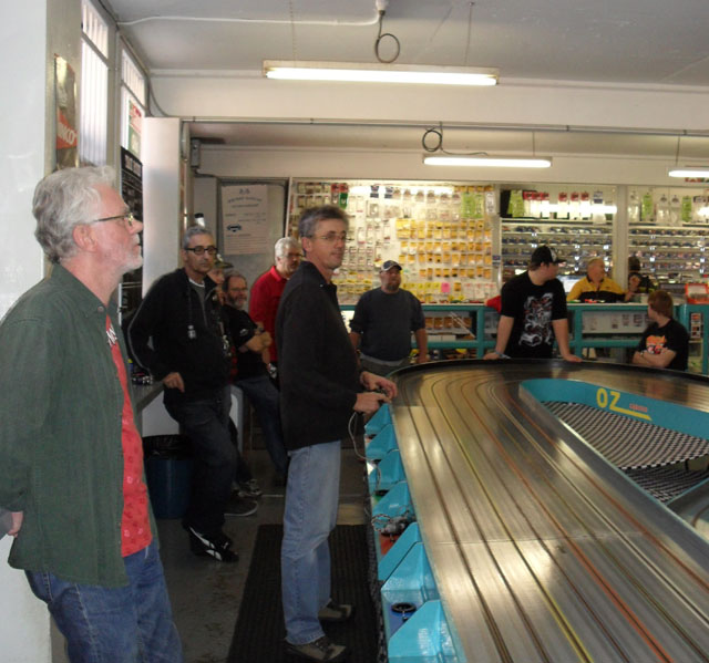 A moment in qualifying.<br />Mark Fox, John Wiley and Kim Axton in the foreground.