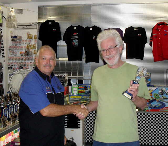 Mark Fox happily accepting the Winners Trophy.